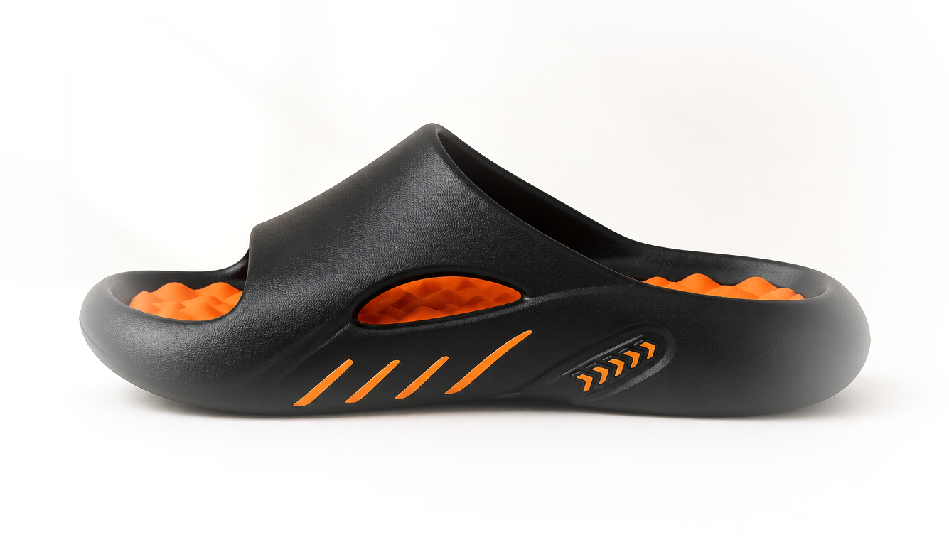 Sandalia Milano Comfort de perfil: suela gruesa de una sola pieza y plantilla naranja con relieve